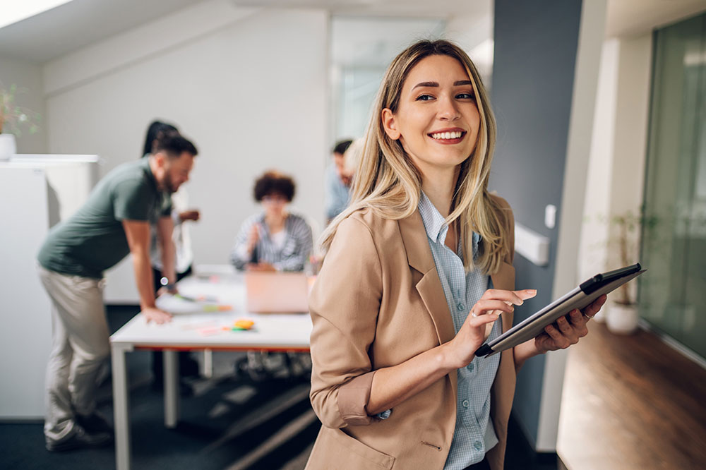 Smiling woman in office